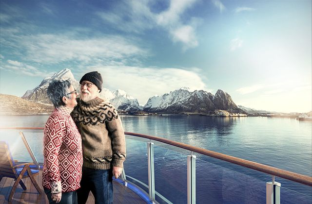 Havila Voyages Couple on deck Lofoten Havila Voyages.png