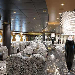 Musica Class,Ship,Bar,The Zebra Bar,Lamp,Armchair,Sofa,Table,MSC Poesia